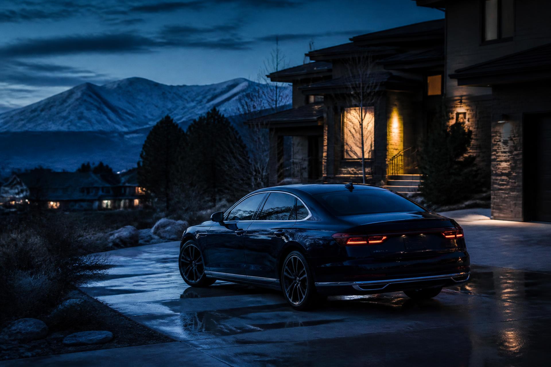 Detailer working on a car in a Utah driveway